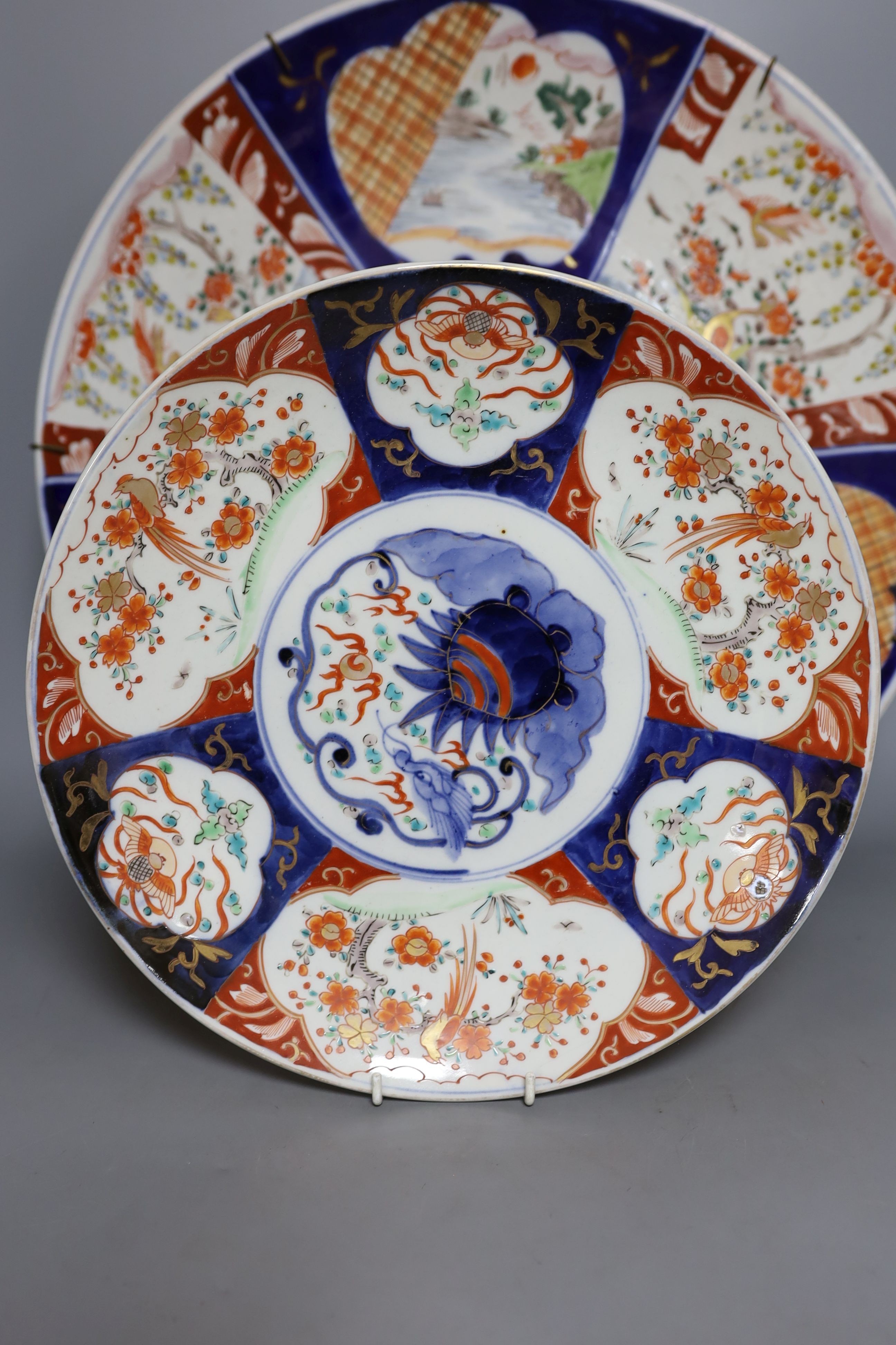 Two Imari dishes, largest 45cm., and an Imari bowl